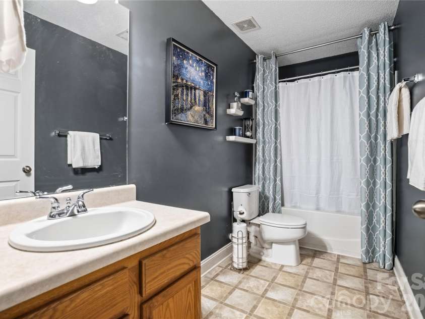 13310 Pontchatrain Avenue, Charlotte, NC 28273.  MLS# CAR4377198, YatesRealty ID 30358. Hall bathroom is very spacious