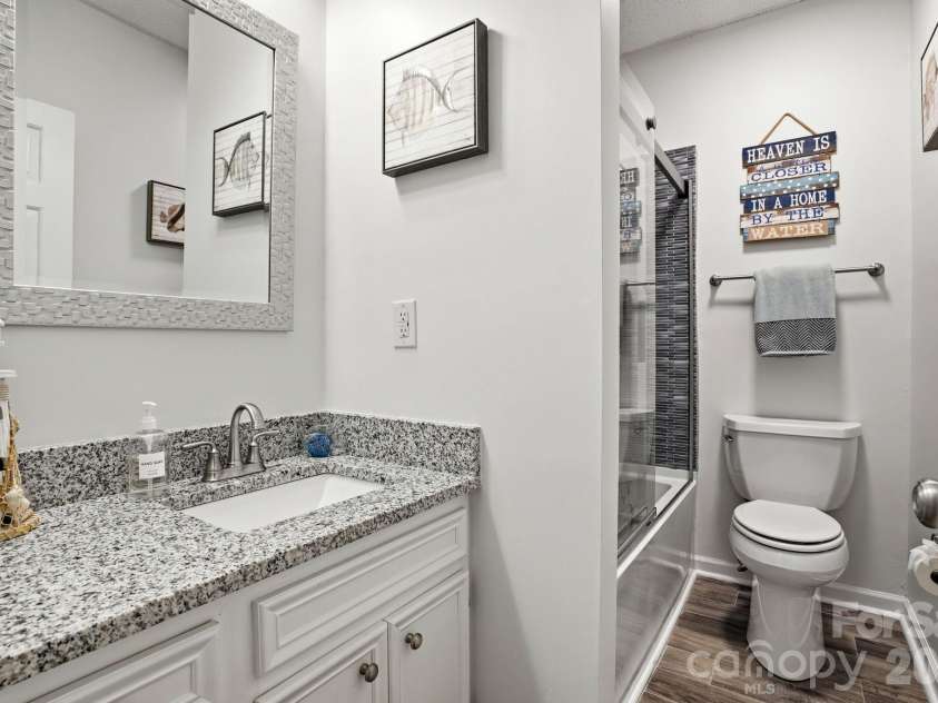 8188 Normandy Road, Denver, NC 28037.  MLS# CAR4383571, YatesRealty ID 30359. Basement level full bathroom