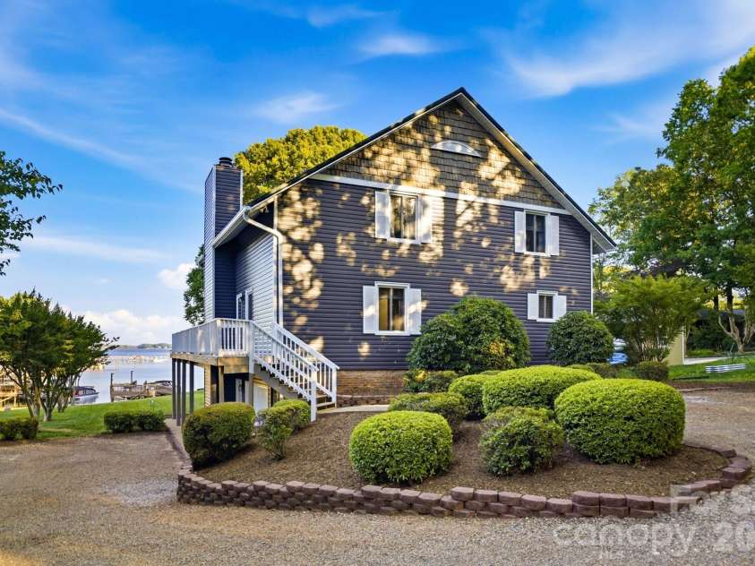 8188 Normandy Road, Denver, NC 28037.  MLS# CAR4383571, YatesRealty ID 30359. Side view from the driveway
