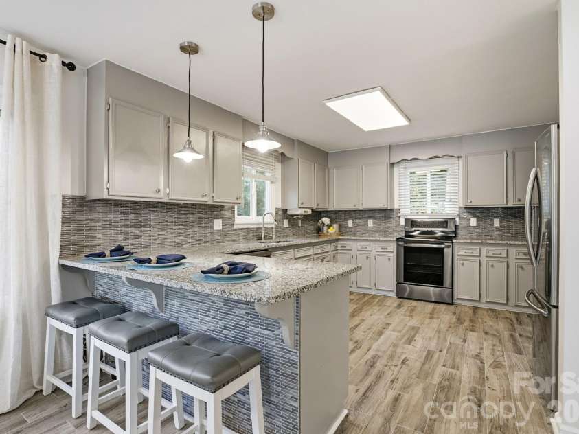 8188 Normandy Road, Denver, NC 28037.  MLS# CAR4383571, YatesRealty ID 30359. Updated kitchen with breakfast bar