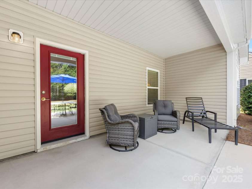 2513 Rosebud Court, Tega Cay, SC 29708.  MLS# CAR4284006, YatesRealty ID 30360. Covered extended patio