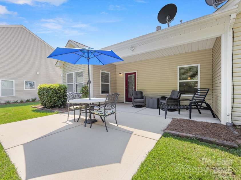 2513 Rosebud Court, Tega Cay, SC 29708.  MLS# CAR4284006, YatesRealty ID 30360. Covered extended patio