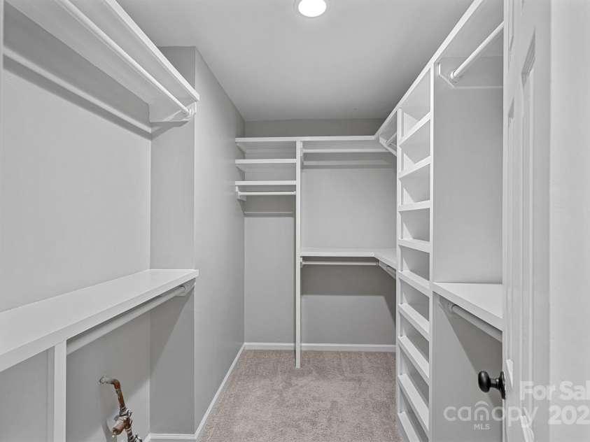 10415 Danesway Lane, Cornelius, NC 28031.  MLS# CAR4284118, YatesRealty ID 30361. Custom built primary closet