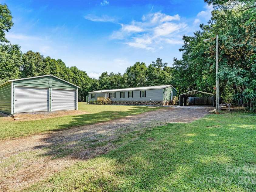 2800 Brushwood Circle, Newton, NC 28658.  MLS# CAR4288280, YatesRealty ID 30364. Double Detached Carport