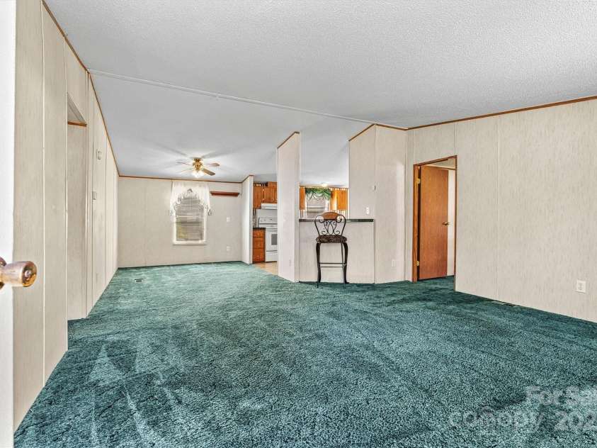 2800 Brushwood Circle, Newton, NC 28658.  MLS# CAR4288280, YatesRealty ID 30364. Front Entry into Living Room/Dining Area View