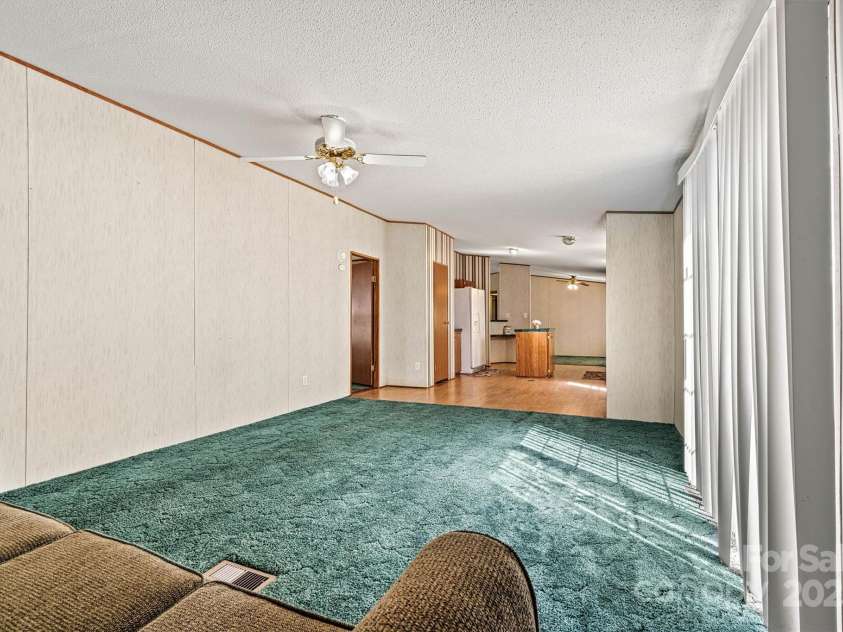 2800 Brushwood Circle, Newton, NC 28658.  MLS# CAR4288280, YatesRealty ID 30364. Open Concept Den/Kitchen/Dining View