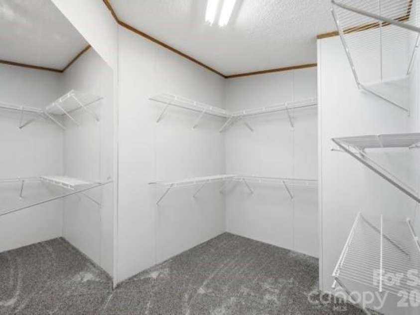 864 Stowe Lane, Gastonia, NC 28056.  MLS# CAR4385631, YatesRealty ID 30365. Extra large primary bedroom walk in closet