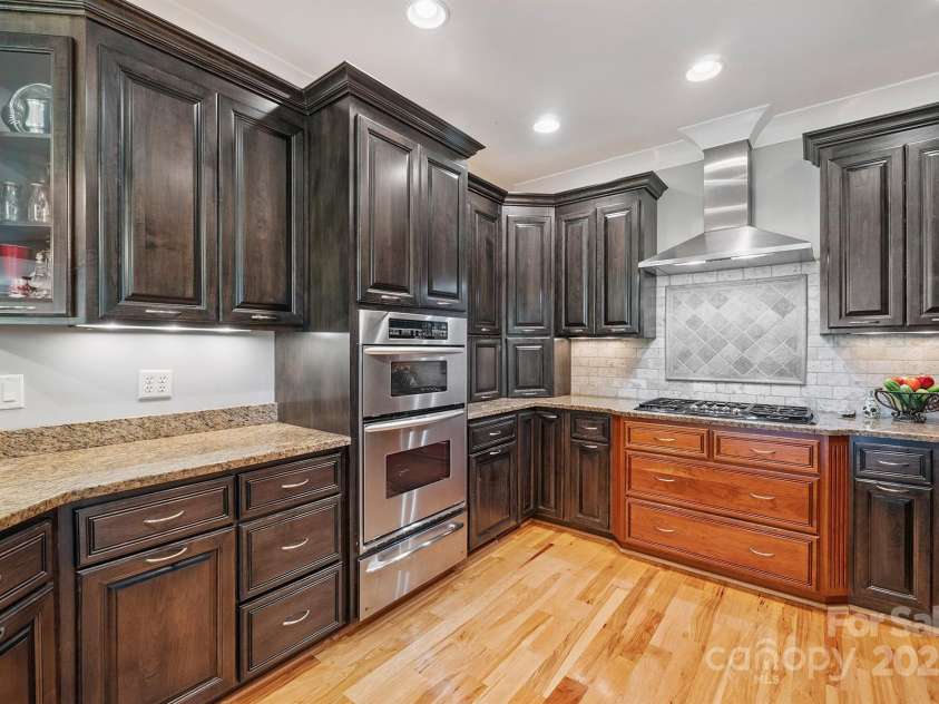 8304 Renee Ford Road, Stanfield, NC 28163.  MLS# CAR4281370, YatesRealty ID 30368. 5 Burner Gas Range, Wall Oven with Warming Drawer and Microwave