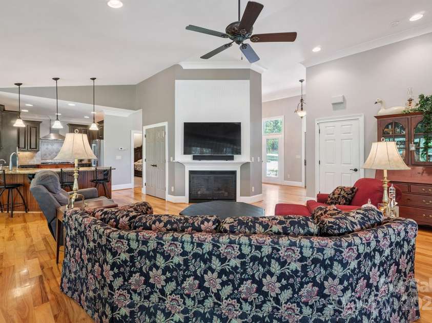 8304 Renee Ford Road, Stanfield, NC 28163.  MLS# CAR4281370, YatesRealty ID 30368. Another view of the Great Room and Kitchen