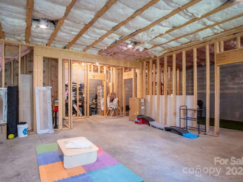50 Red Clover Lane, Pisgah Forest, NC 28768.  MLS# CAR4271803, YatesRealty ID 30371. Basement framed for storage, etc.