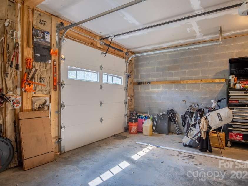 50 Red Clover Lane, Pisgah Forest, NC 28768.  MLS# CAR4271803, YatesRealty ID 30371. Basement garage