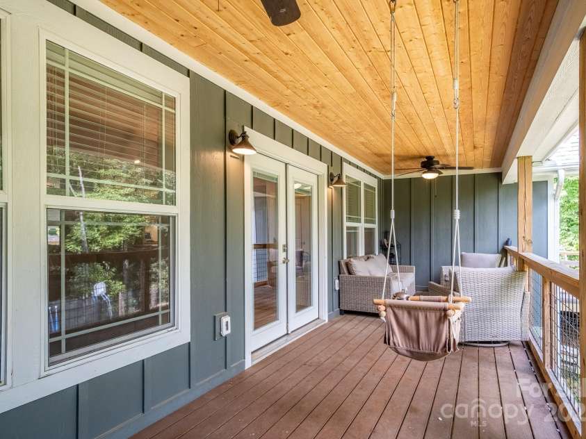 50 Red Clover Lane, Pisgah Forest, NC 28768.  MLS# CAR4271803, YatesRealty ID 30371. Covered porch just off the living room