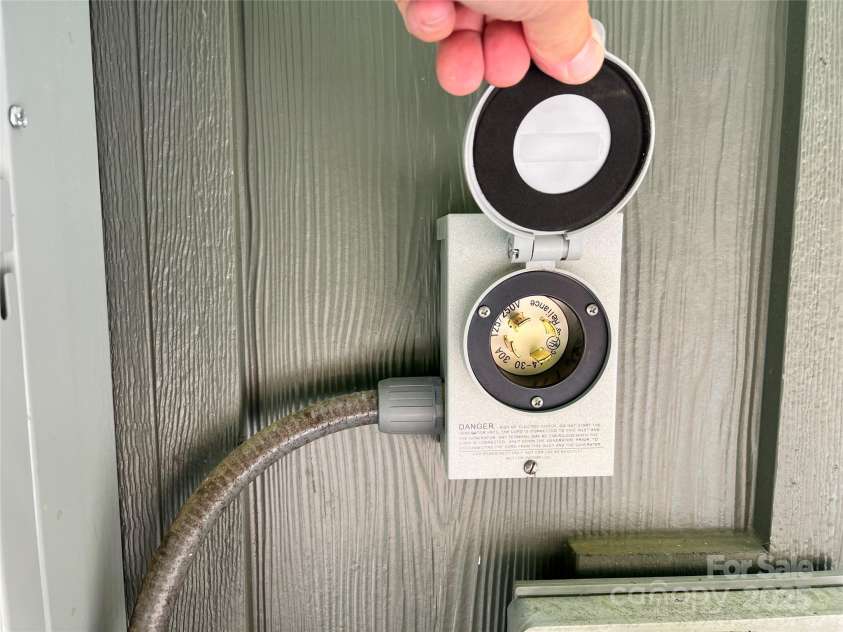 50 Red Clover Lane, Pisgah Forest, NC 28768.  MLS# CAR4271803, YatesRealty ID 30371. Generator connection