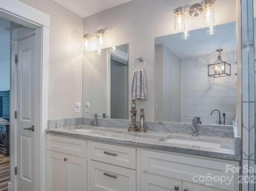 50 Red Clover Lane, Pisgah Forest, NC 28768.  MLS# CAR4271803, YatesRealty ID 30371. Primary dual vanity