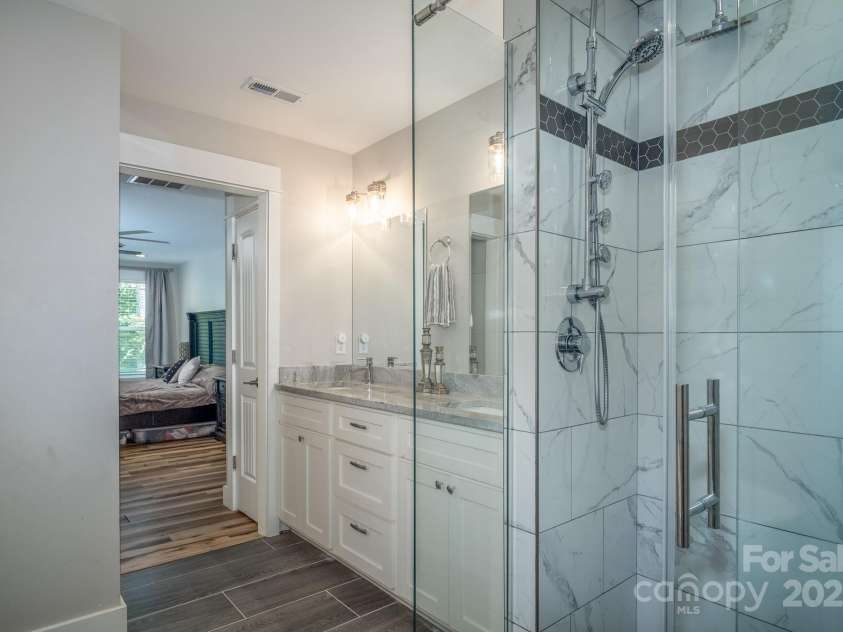 50 Red Clover Lane, Pisgah Forest, NC 28768.  MLS# CAR4271803, YatesRealty ID 30371. Shower and tub