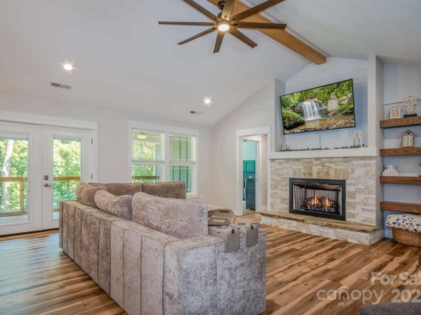 50 Red Clover Lane, Pisgah Forest, NC 28768.  MLS# CAR4271803, YatesRealty ID 30371. View out to the covered porch