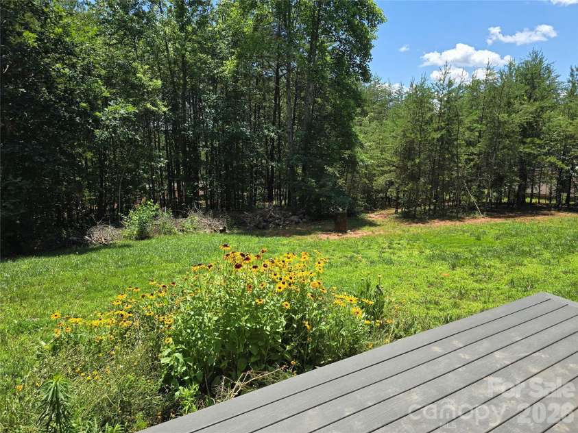 980 Smith Waldrop Road, Mill Spring, NC 28756.  MLS# CAR4393212, YatesRealty ID 30372. Fully fenced back yard