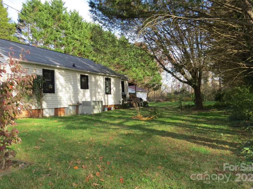 155 6th Street, Taylorsville, NC 28681.  MLS# CAR4204136, YatesRealty ID 30373. Side of house