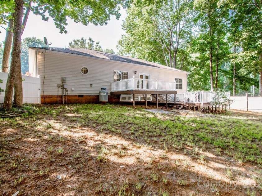 146 Valley Glen Drive, Troutman, NC 28166.  MLS# CAR4267527, YatesRealty ID 30375. Large Backyard with Privacy Vinyl Fenced—gates on both sides of the house and an oversized double gate.