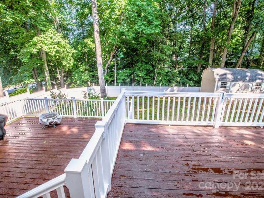146 Valley Glen Drive, Troutman, NC 28166.  MLS# CAR4267527, YatesRealty ID 30375. Two-Level Deck and Storage Building