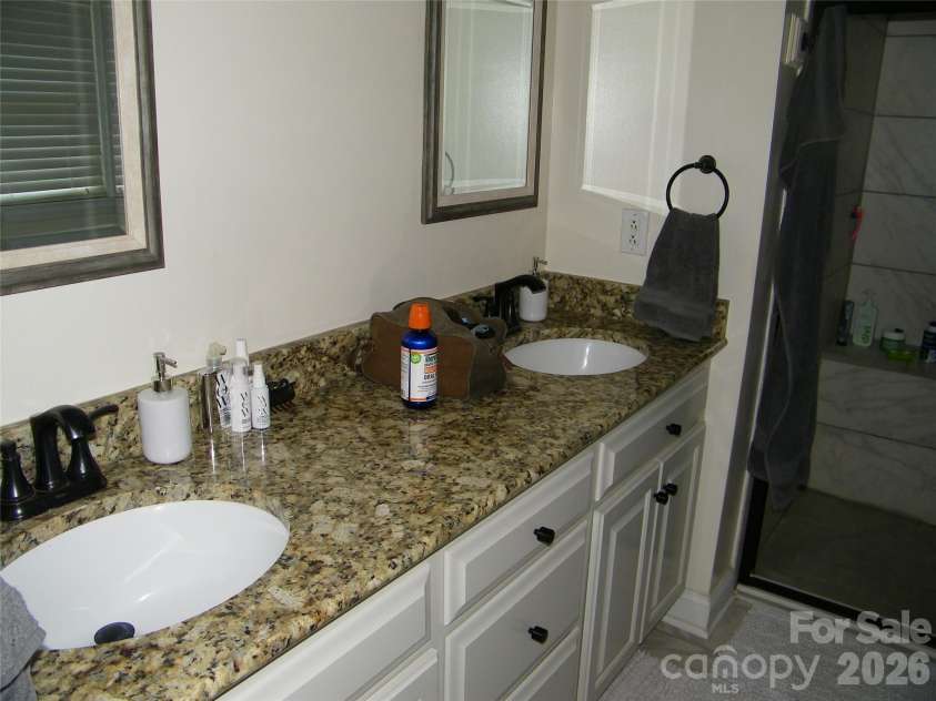 609 Redah Avenue, Locust, NC 28097.  MLS# CAR4393340, YatesRealty ID 30375. 