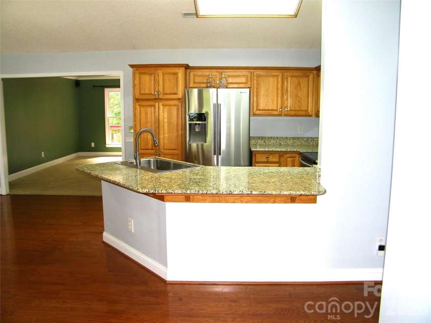 609 Redah Avenue, Locust, NC 28097.  MLS# CAR4393340, YatesRealty ID 30375. 