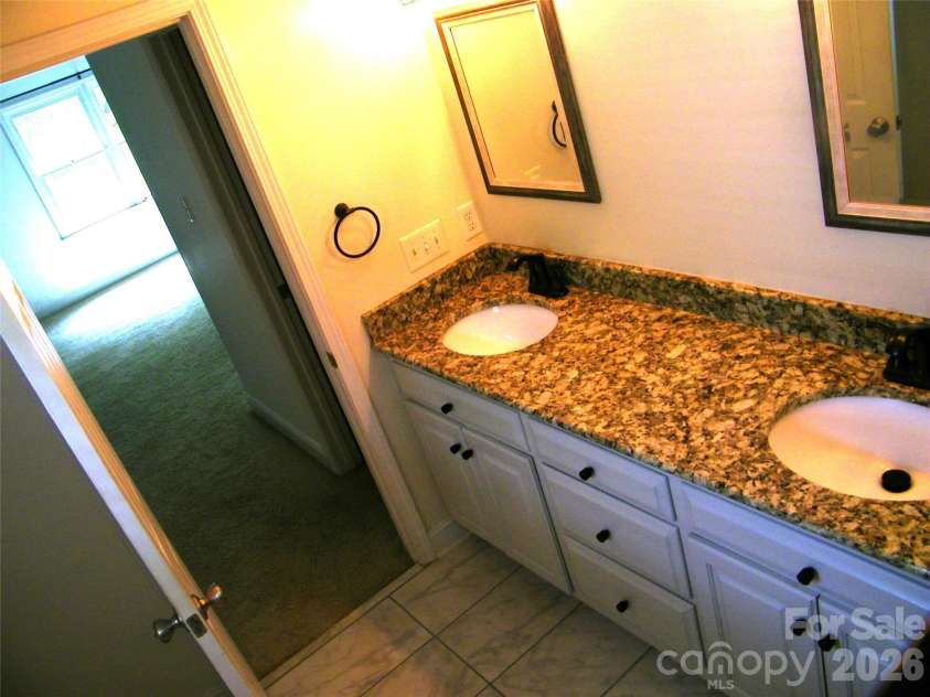 609 Redah Avenue, Locust, NC 28097.  MLS# CAR4393340, YatesRealty ID 30375. 
