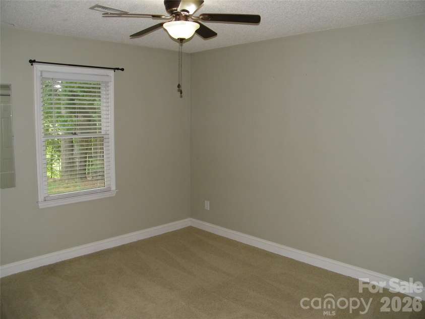 609 Redah Avenue, Locust, NC 28097.  MLS# CAR4393340, YatesRealty ID 30375. 