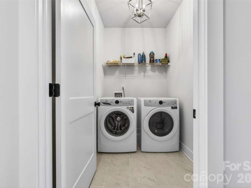 106 Wesser Street, Davidson, NC 28036.  MLS# CAR4382368, YatesRealty ID 30388. Dedicated Laundry Room