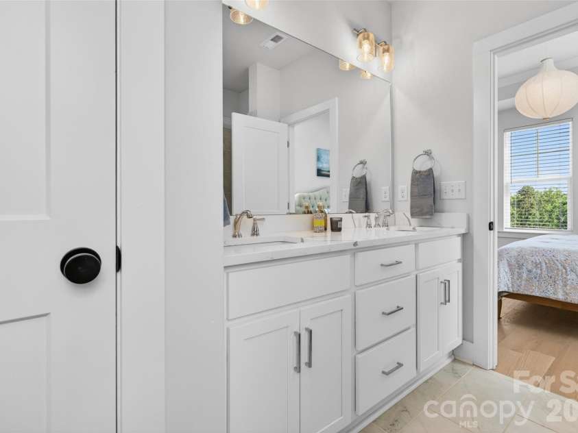 106 Wesser Street, Davidson, NC 28036.  MLS# CAR4382368, YatesRealty ID 30388. Primary Bathroom With Dual Sinks