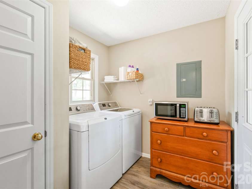 3216 Hitching Post Lane, Rock Hill, SC 29732.  MLS# CAR4371992, YatesRealty ID 30389. Laundry Room with shelving