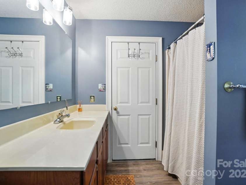 6649 Forney Hill Road, Denver, NC 28037.  MLS# CAR4287843, YatesRealty ID 30391. 4TH FULL BATH OFF GARAGE OFFICE DOWNSTAIRS