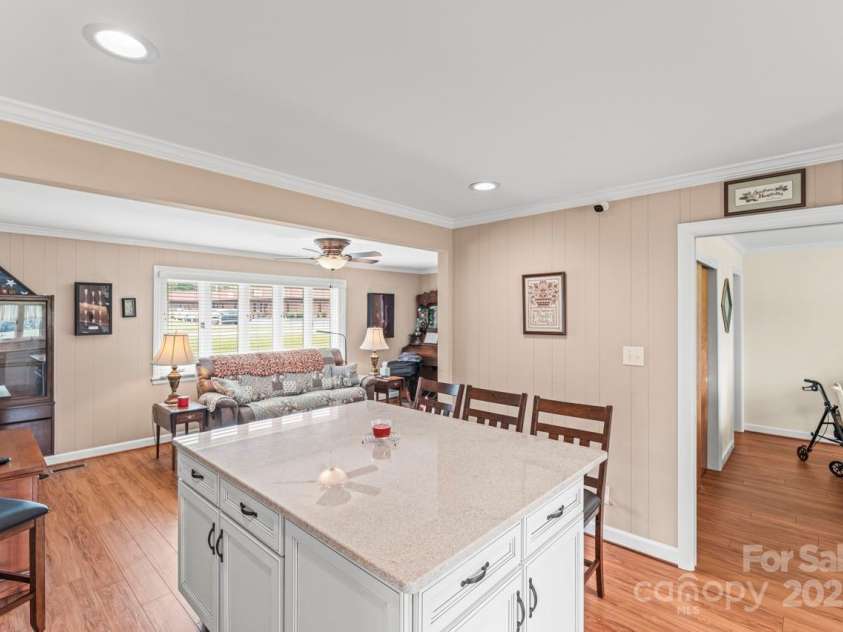 128 Killian Farm Road, Stanley, NC 28164.  MLS# CAR4288617, YatesRealty ID 30393. Large center island with additional drawer and cabinet space