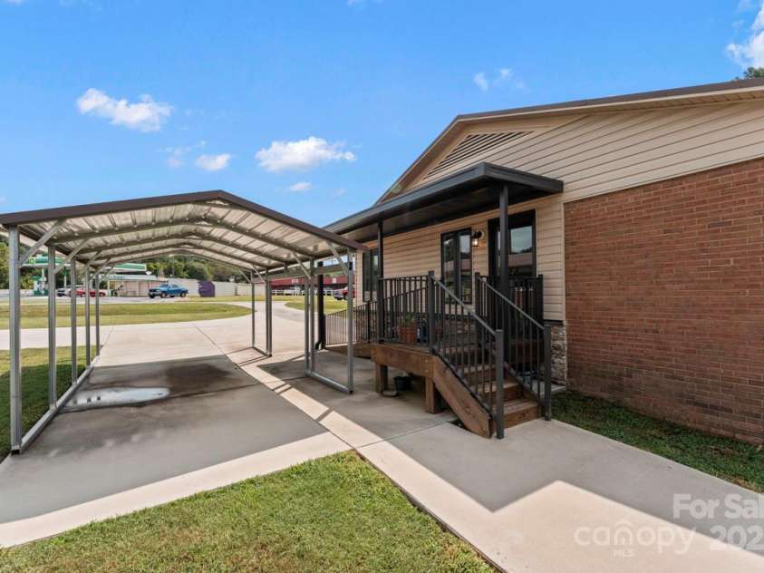 128 Killian Farm Road, Stanley, NC 28164.  MLS# CAR4288617, YatesRealty ID 30393. Metal carport