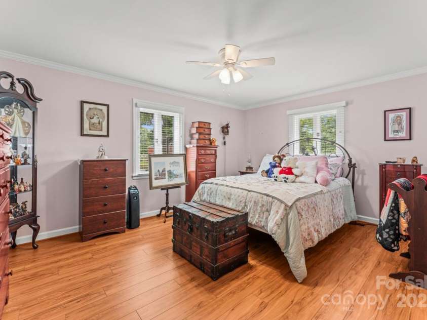 128 Killian Farm Road, Stanley, NC 28164.  MLS# CAR4288617, YatesRealty ID 30393. Spacious primary bedroom