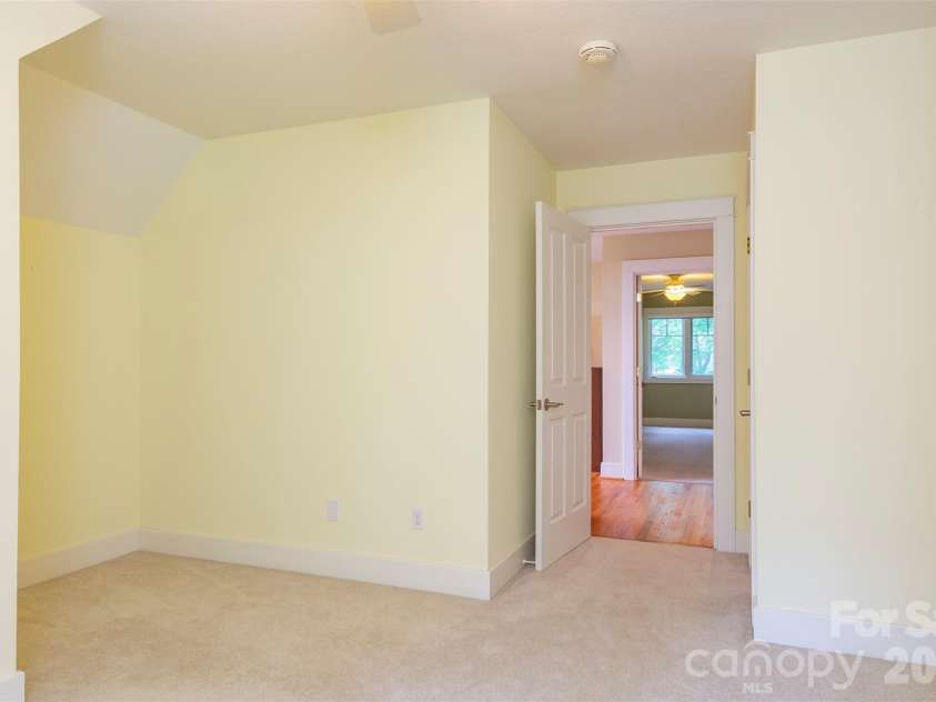 204 Briarcliff None, Asheville, NC 28804.  MLS# CAR4356958, YatesRealty ID 30393. Guest bedroom on second floor