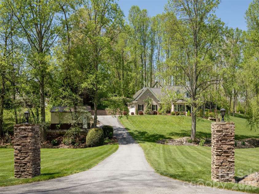 514 Whispering Hills Drive, Hendersonville, NC 28792.  MLS# CAR4330403, YatesRealty ID 30396. 