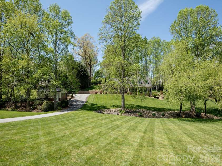 514 Whispering Hills Drive, Hendersonville, NC 28792.  MLS# CAR4330403, YatesRealty ID 30396. 