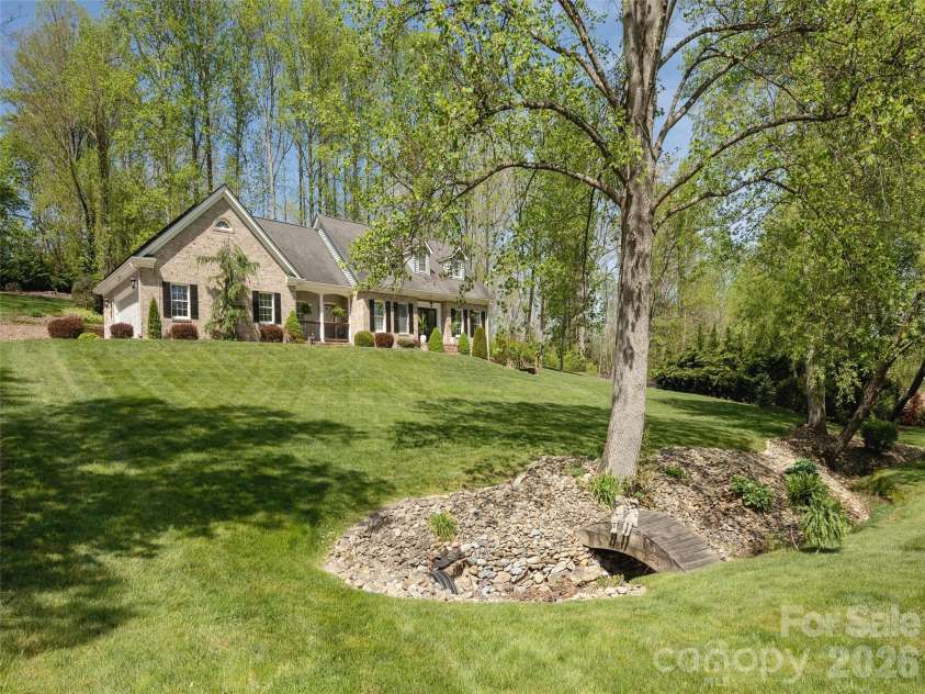 514 Whispering Hills Drive, Hendersonville, NC 28792.  MLS# CAR4330403, YatesRealty ID 30396. 