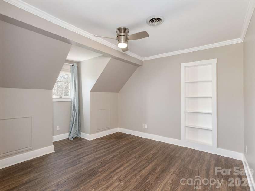 514 Whispering Hills Drive, Hendersonville, NC 28792.  MLS# CAR4330403, YatesRealty ID 30396. Built in book case