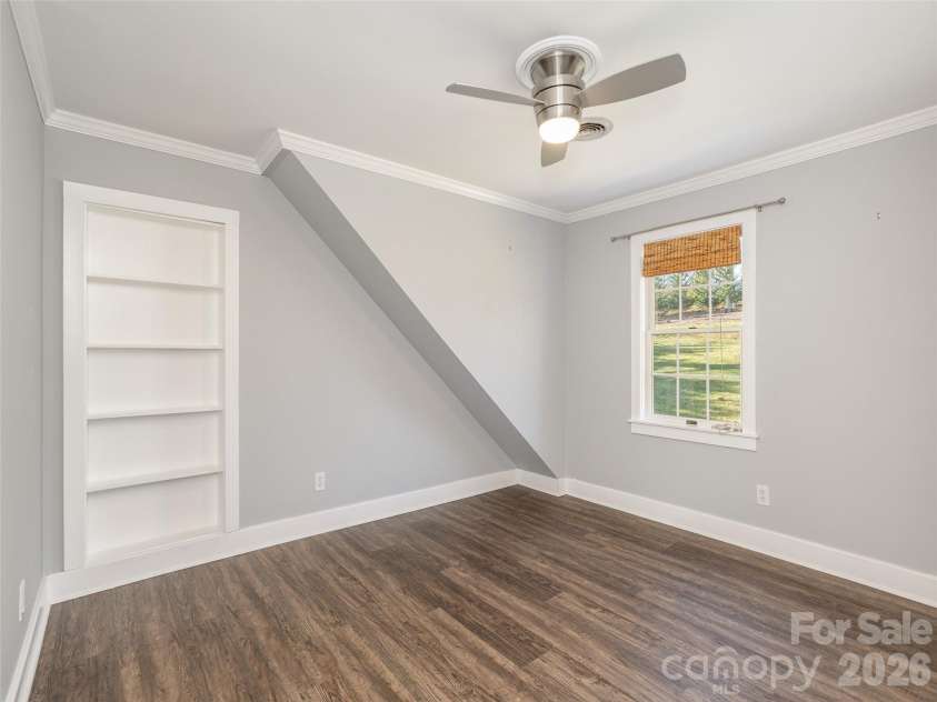514 Whispering Hills Drive, Hendersonville, NC 28792.  MLS# CAR4330403, YatesRealty ID 30396. Built in book case