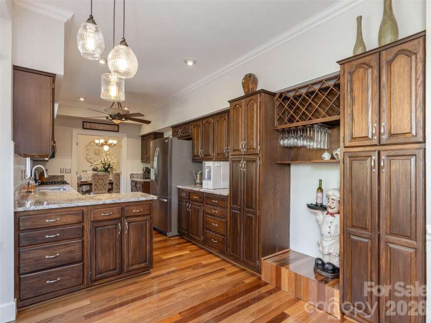 514 Whispering Hills Drive, Hendersonville, NC 28792.  MLS# CAR4330403, YatesRealty ID 30396. Built in wine rack and pantry