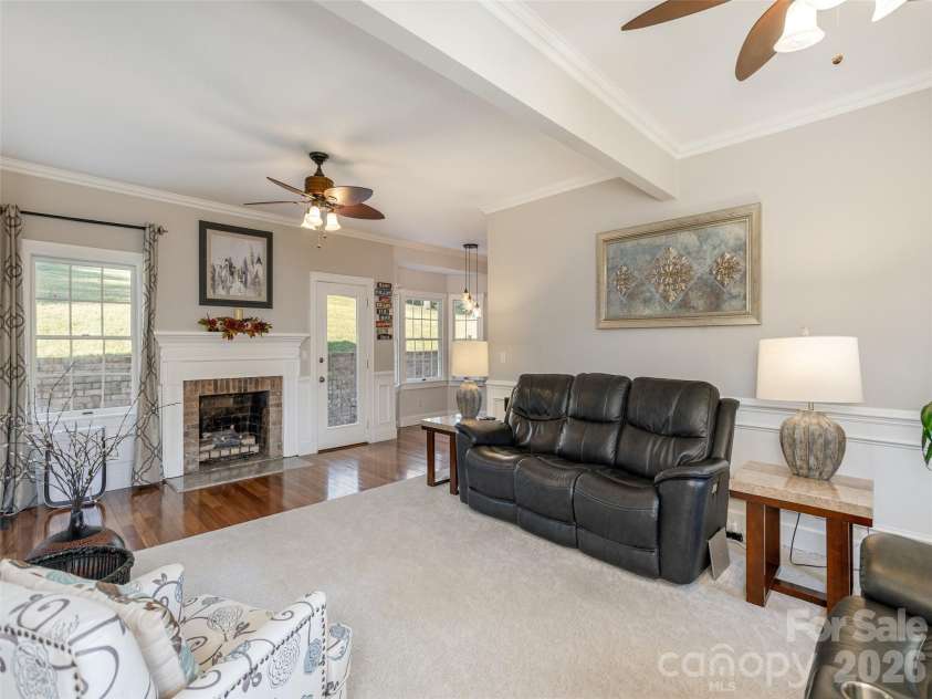 514 Whispering Hills Drive, Hendersonville, NC 28792.  MLS# CAR4330403, YatesRealty ID 30396. Den w/ FP- main level