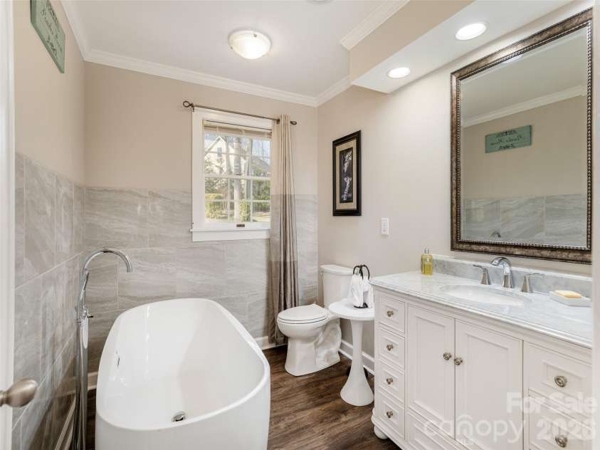 514 Whispering Hills Drive, Hendersonville, NC 28792.  MLS# CAR4330403, YatesRealty ID 30396. Guest bathroomupper level
