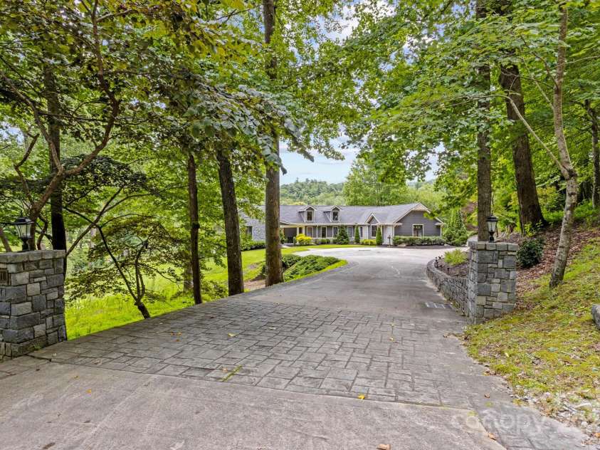 301 Winding Meadows Drive, Flat Rock, NC 28731.  MLS# CAR4286290, YatesRealty ID 30399. 