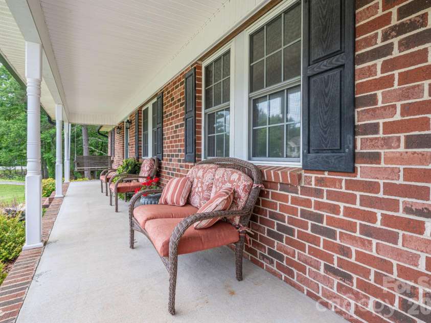 2479 Old Pond Drive, Lincolnton, NC 28092.  MLS# CAR4390192, YatesRealty ID 30406. Rock chair front porch
