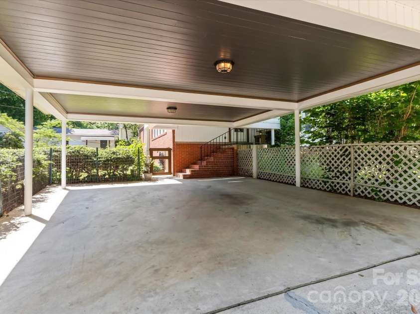 354 Bost Street, Statesville, NC 28677.  MLS# CAR4344460, YatesRealty ID 30407. Side carport