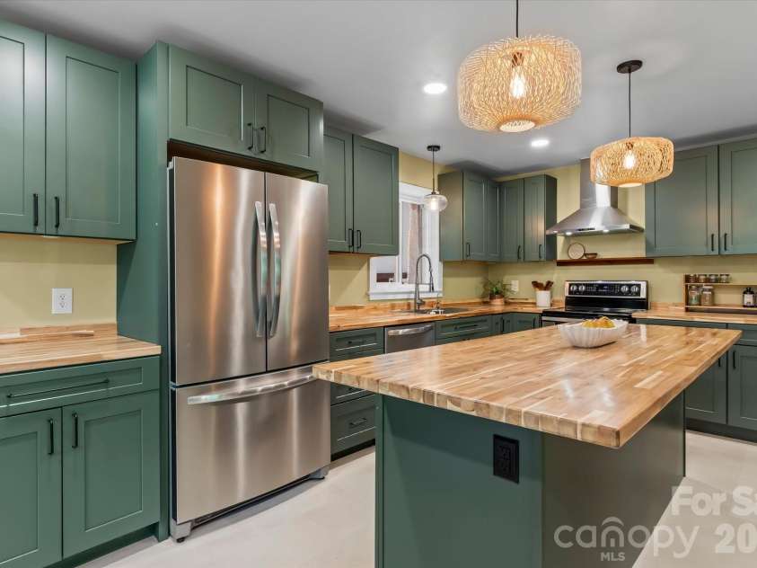 354 Bost Street, Statesville, NC 28677.  MLS# CAR4344460, YatesRealty ID 30407. Stunning renovated kitchen.