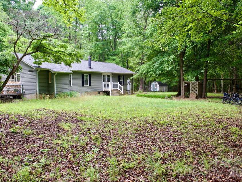 908 Buddys Choice Road, York, SC 29745.  MLS# CAR4381686, YatesRealty ID 30413. Back yard and back of home