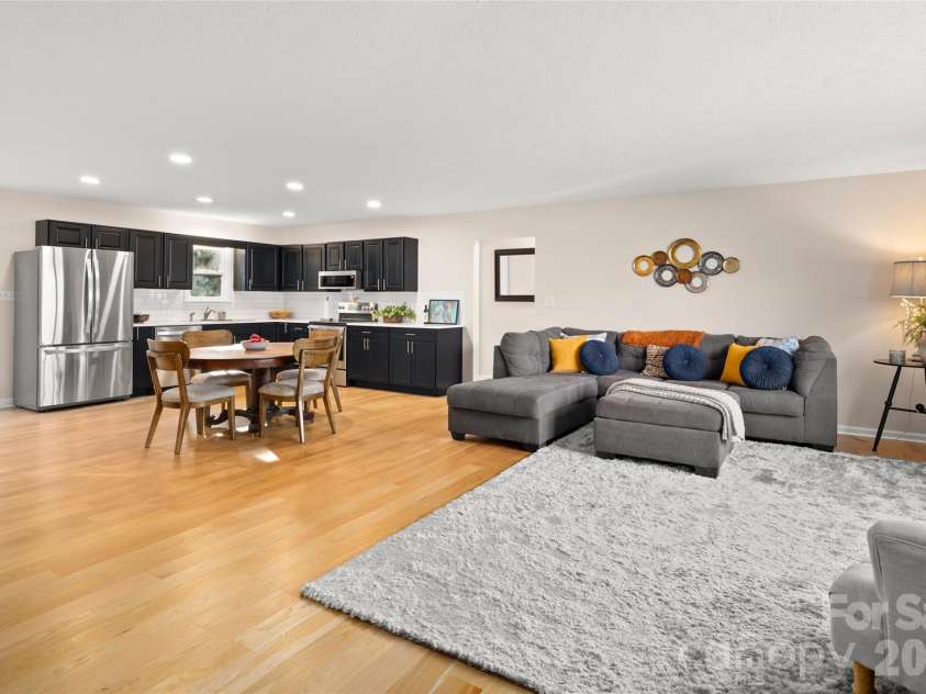 73 The Old Run Road, Fairview, NC 28730.  MLS# CAR4329903, YatesRealty ID 30415. Open floor plan with solid white oak flooring